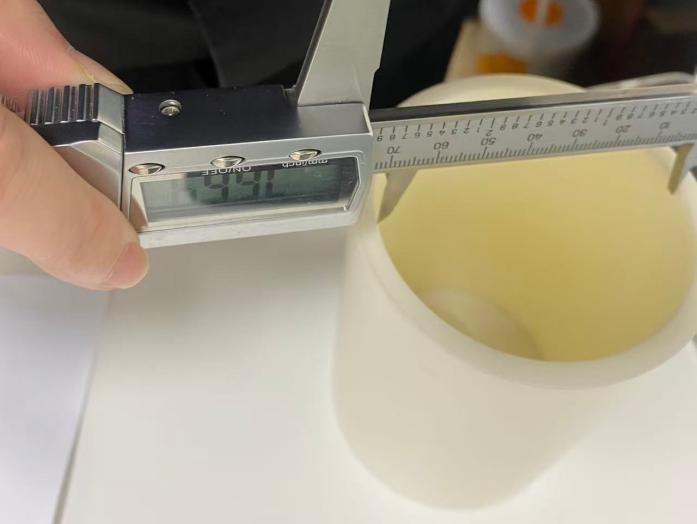 Measuring inner diameter of ABS core tubing with digital caliper